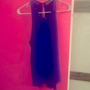 Royal blue sleeveless blouse with gold studs around the neck, Size M